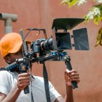 Professional videographer filming an event in Nairobi, Kenya