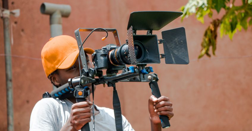 Professional videographer filming an event in Nairobi, Kenya